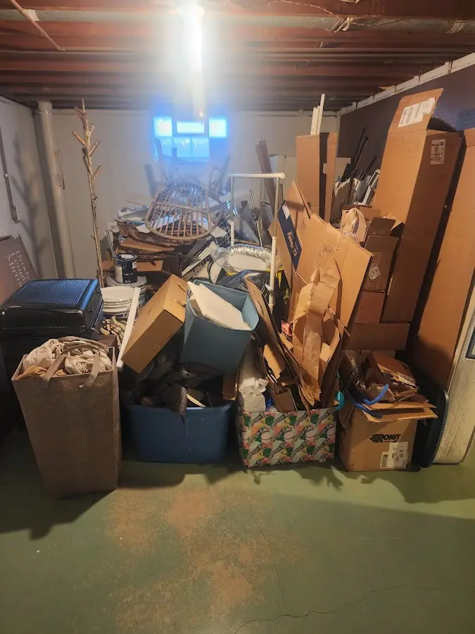 Roll-off dumpster container at job site for 2 Yard Dumpster Rental in Crescent Springs